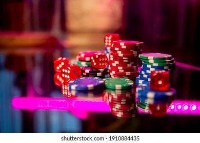 Casino. Poker. Game Pieces And Dice Are On The Table. Game Chips For Betting In Gambling. Dice. Poker Chips.