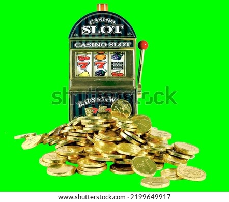casino slots winning lots of gold    cut out with  green background 
