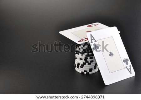 Casino. Two aces on stack of poker chips, winning concept. Gambling concept with playing cards and poker chips