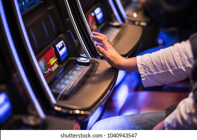Casino Video Slots Game Playing. Caucasian Woman Feeling Lucky in the Vegas Casino. - Shutterstock ID 1040943547