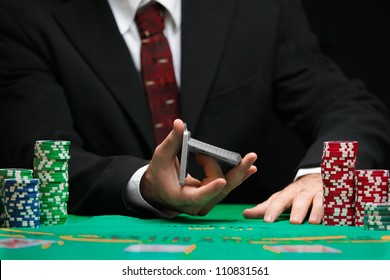 Casino Worker Shuffling Cards