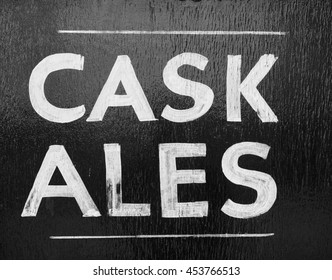 Cask Ales Sign Outside A British Pub Serving Real Ale In Black And White