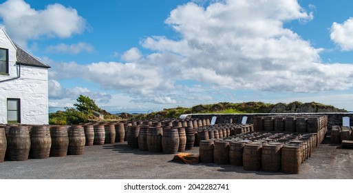 Casks And Barrels In A Whiskey Distillery Islay In Scotland Coast