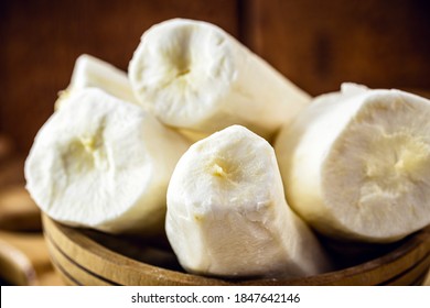 cassava, a root used in Brazilian cuisine, called macaxeira, cassava, castelinha, uaipi, sweet cassava, maniva, maniveira and poor bread. root inside wooden pots