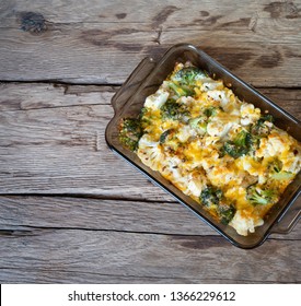 Casserole With Cabbage, Brocolli   And Cheese On Wood Deck.