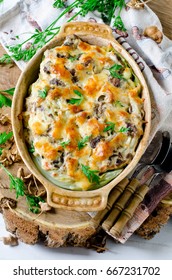 Casserole from cabbage with mushrooms - Shutterstock ID 667231702