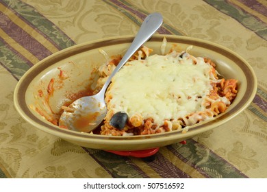 Casserole Pf Whole Wheat Rotini Pasta, Ground Turkey Meat, Cheese, Sliced Black Olives And Tomato Sauce In Glass Baking Dish