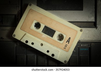 Cassette Tape On Dusty Retro Player. 