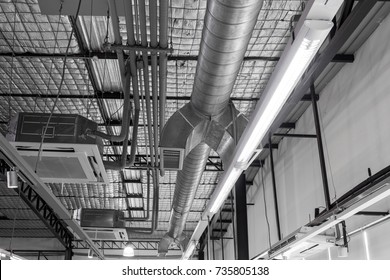 Cassette Type, Air Condition And Hvac System Under Bare Skin Ceiling Of Insulated Metal Roof.