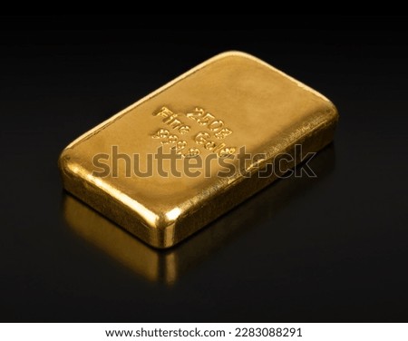 Cast gold bar, front view, over black. Stamped bullion bar of 250 gram or 8.04 troy oz refined gold. Real money, store of value and traditional way of investing in precious metals for over 4000 years.