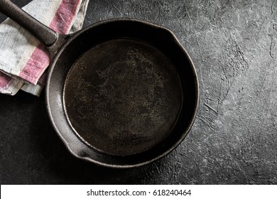 Cast Iron Pan On Rustic Black Stone Background Close Up -  Empty Black Frying Pan Frying Skillet With Copy Space