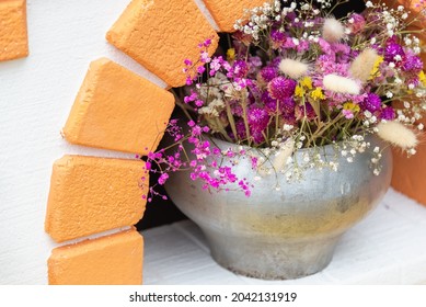 Cast Iron Pot With Dried Flowers On The Stove (Ekibana).