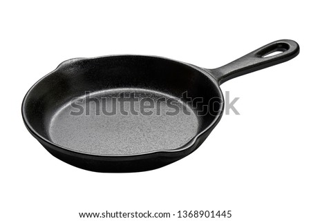 Cast iron skillet, Empty cast iron pan with handled isolated on white background with clipping path, Side view                                        
