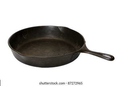 Cast iron skillet isolated on white background with clipping path.