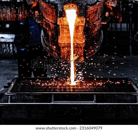 Cast iron smelting and casting plant, Technical equipment factory metal smelting, Molten iron is poured into the heart, A very hot metal smelter