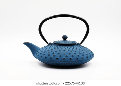 Cast iron teapot isolated on white background.