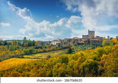 Castellina in Chianti village, vineyard and autumn foliage. Tuscany, Italy. Europe.