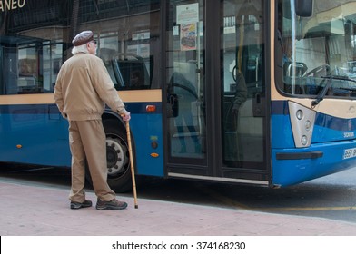 CASTELLON, SPAIN - 2016: an older man waits for the bus