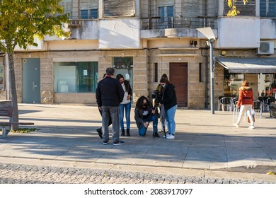 Castelo Branco, Portugal - November 30 2021: Female Film Crew Setting Up On The Streets Of Castelo Branco