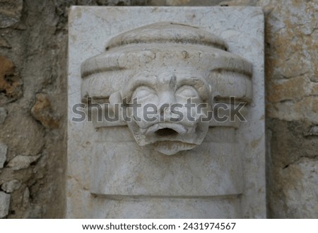 Castelo de S. Jorge interiour stone decorations. Stone sculptures at the Saint George castle in Lisbon, Portugal. Lisbon stone decorations of the castle. 