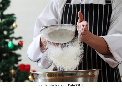 Caster Sugar Sifting Through A Sieve For A Baking