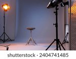 Casting call. Chair and different equipment in modern studio