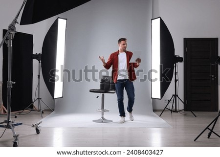 Casting call. Man with script performing in studio