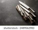 Casting steel various chef knife, Set of modern sharp kitchen knives on dark background