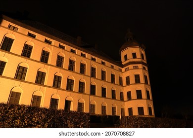 Castle By Night. Large Old White Building With A Black Sky Or Background. Skokloster, Outside Stockholm, Sweden, Scandinavia, Europe.