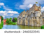 The Castle of the Counts Gravensteen medieval castle with stone walls on bank of Lieve water canal in Ghent historical city centre, Gent old town, East Flanders province, Flemish Region, Belgium