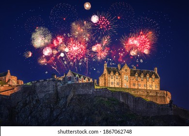 The Castle Of Edinburgh With Fireworks During Hogmanay