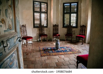 Castle Interior, Retro Style Room Persian Rug, Chinese Vase, Carved Wooden Chairs, Stained Glass Windows, UNESCO World Heritage Site, Chateau Telc, Czech Republic, June 09, 2018