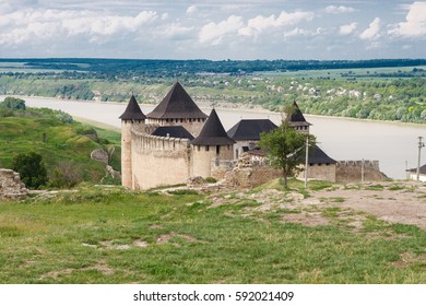 Castle is located near river. Now is a tourist attraction. - Shutterstock ID 592021409