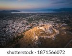 The castle on Larissa Hill, located near the town of Argos, Greece on sunrise light aerial view