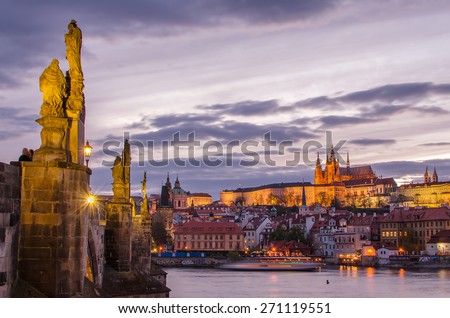 Castle of Prague (Czech Republic), Charles (Karluv) Bridge and Vltava River in the sunset. Beautiful representative touristic cityscape with main sightseeing of the capital city. 
