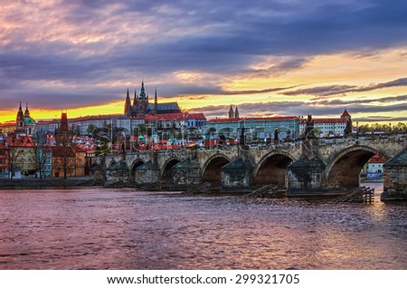 Castle of Prague (Czech Republic), Charles (Karluv) Bridge and Vltava River in the sunset. Farytale picture of the most beautiful city in Central and Eastern Europe.