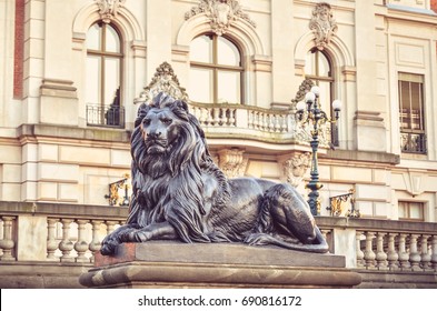 Castle in Pszczyna Town in Poland. An ornament in the form of a lion in front of a castle facade. - Shutterstock ID 690816172