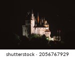 the castle of the sleeping beauty in the night