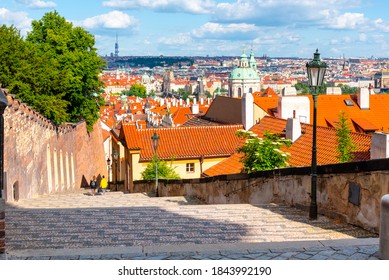 Castle Stairs of Prague Castle leads down to Lesser Town with Saint Nicholas church, Praha, Czech Republic.