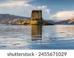 Castle stalker, A castle satiated on a small tidal island on a loch in Scotland  