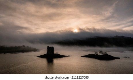 Castle Stalker Silhouette Aerial View Near Glencoe And Oban In The Scottish Highlands. 