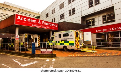 Castle Street, Glasgow, Scotland, UK; March 14th 2018: Ambulances at the entrance to the Accident and Emergency department of the Royal Infirmary.