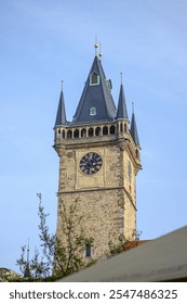 castle tower with a clock face on the wall