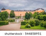 Castle of Uppsala in Sweden, with the botanical garden in front. Sun shining through on a dark cloudy day.
Castle with botanic garden, Uppsala, Sweden, 2016-08-09