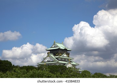 The castle which is under the white cloud and blue sky.
