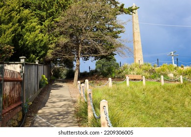 Castlemaine, Vic Australia - October 1 2022: Looking Uphill To Historical Marker Commemorating Australian Expedition Journey Against Stormy Sky