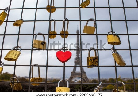 Castles Against the Backdrop of the Eiffel Tower in Paris, France. Attractions, Tourist Places. Multi-colored Locks as a Symbol of Eternal Love.