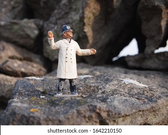 Castleton, Peak District, UK. Feb 2020. Vintage Police Man On Dry Stone Wall.