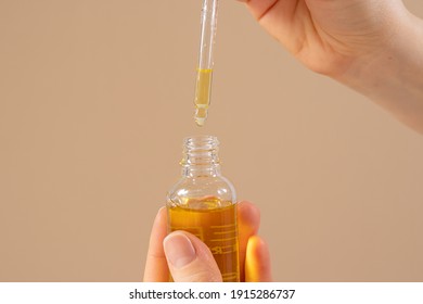 Castor Oil For Eyelashes And Eyebrows For Hair Growth In A Glass Jar With A Dropper