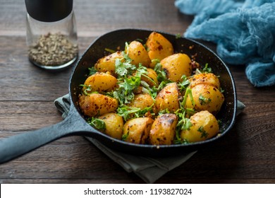 Castor Potatoes In A Cast Iron Skillet